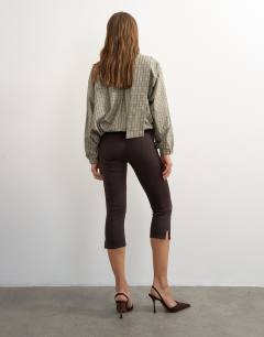 Model wearing Ponte capri leggings in chocolate