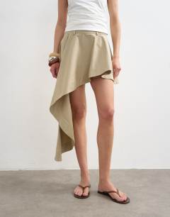 Model wearing Poplin asymmetric mini skirt in stone
