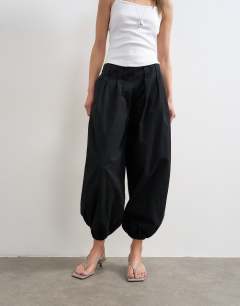 Model wearing Poplin balloon trouser in black