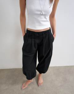 Model wearing Poplin balloon trouser in black