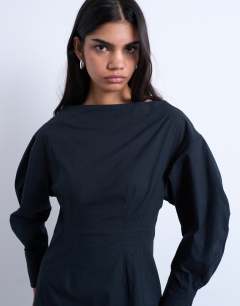 Model wearing Poplin barrel sleeve cinch dress in black