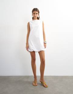 Model wearing Poplin bubble cape mini dress in white