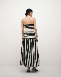 Model wearing Poplin dropped waist bandeau maxi dress in thick mono stripe