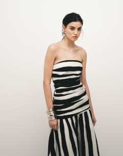 Model wearing Poplin dropped waist bandeau maxi dress in thick mono stripe