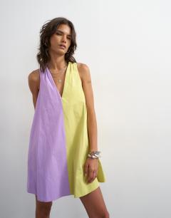 Model wearing Poplin halter deep hem mini trapeze dress in lilac and lime colour block