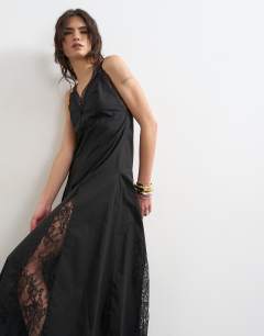 Model wearing Poplin lace godet midi dress in black