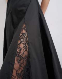 Model wearing Poplin lace godet midi dress in black