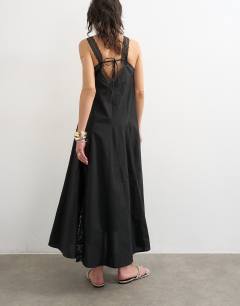Model wearing Poplin lace godet midi dress in black