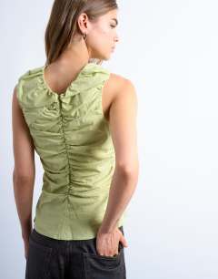 Model wearing Poplin ruched shell top in apple green