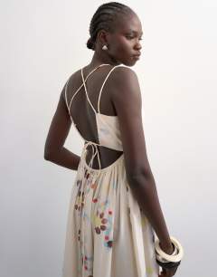 Model wearing Poplin strappy back volume maxi sundress in mosaic print
