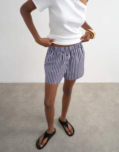 Model wearing Poplin stripe A line boxer short in blue and choc