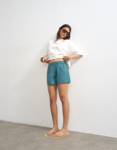 Model wearing Poplin stripe A line boxer short in blue and green stripe