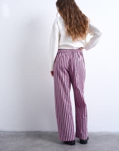 Model wearing Poplin stripe straight leg trouser in pink and purple stripe