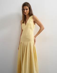 Model wearing Poplin structured dropped waist maxi dress in buttermilk