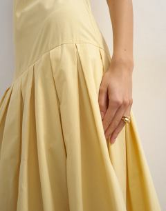 Model wearing Poplin structured dropped waist maxi dress in buttermilk