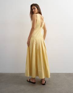 Model wearing Poplin structured dropped waist maxi dress in buttermilk