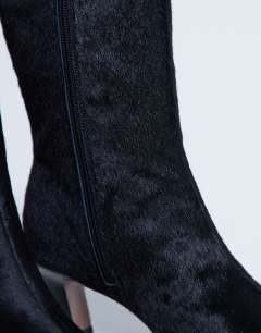 Model wearing Poppy real leather point toe ankle boot in black pony