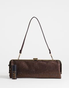 Model wearing Poppy small rectangle clasp shoulder bag in chocolate diamante