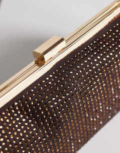 Model wearing Poppy small rectangle clasp shoulder bag in chocolate diamante