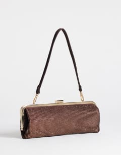 Model wearing Poppy small rectangle clasp shoulder bag in chocolate diamante