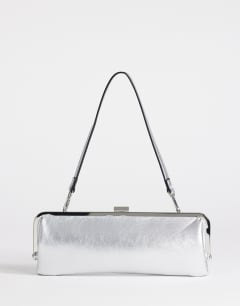 Model wearing Poppy small rectangle clasp shoulder bag in silver