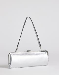 Model wearing Poppy small rectangle clasp shoulder bag in silver