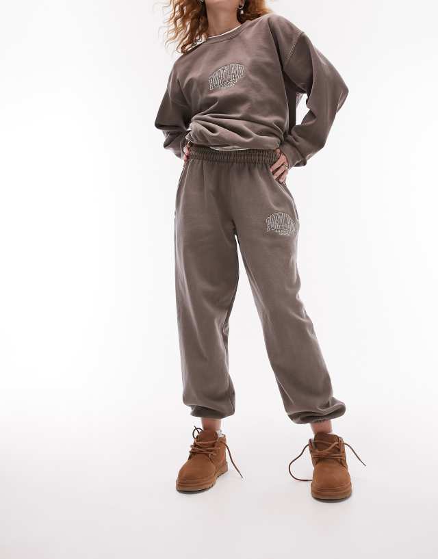 Topshop portland embroidered vintage wash oversized cuffed sweatpants in chocolate