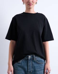 Model wearing Premium basic short sleeve tee in black