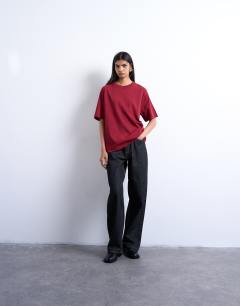 Model wearing Premium basic short sleeve tee in dark red