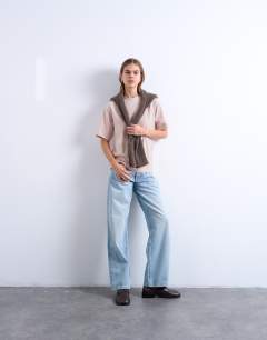 Model wearing Premium basic short sleeve tee in light pink