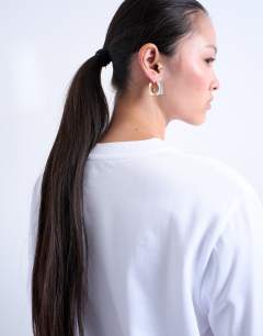 Model wearing Premium basic short sleeve tee in white