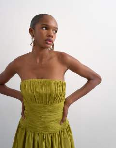 Model wearing Premium bubble hem bandeau maxi dress in green