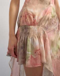 Model wearing Premium chiffon high low maxi dress with smocking detail in watercolour floral