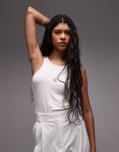 Model wearing Premium double pleat straight leg tailored trouser in white