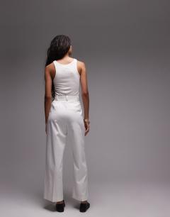 Model wearing Premium double pleat straight leg tailored trouser in white