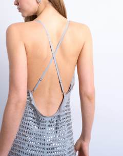 Model wearing Premium embellished low cut maxi dress with open back in silver