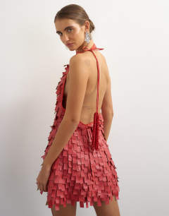 Model wearing Premium faux leather fringed mini dress in red