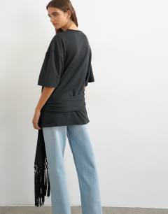 Model wearing Premium fringe tie detail tee in black