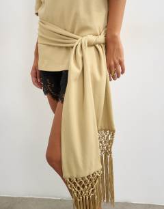 Model wearing Premium fringe tie detail tee in stone