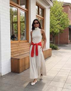 Model wearing Premium funnel neck dropped waist maxi dress in natural woven stripe