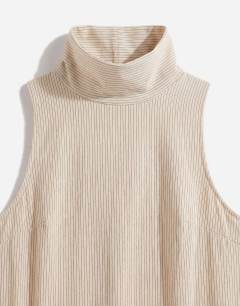 Model wearing Premium funnel neck dropped waist maxi dress in natural woven stripe