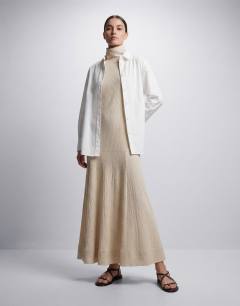 Model wearing Premium funnel neck dropped waist maxi dress in natural woven stripe