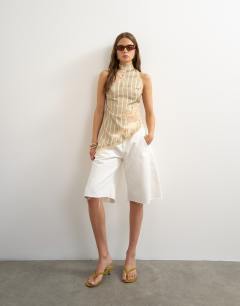 Model wearing Premium halter neck top with contrast lace detail in green stripe