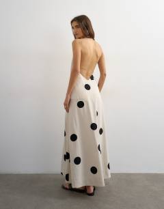 Model wearing Premium halter neck wrap maxi dress in natural mono polka dot