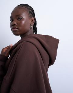 Model wearing Premium heavyweight hoodie in chocolate brown