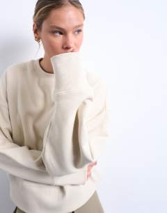 Model wearing Premium heavyweight oversized sweat in sand