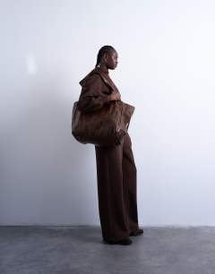 Model wearing Premium heavyweight straight leg jogger in chocolate brown