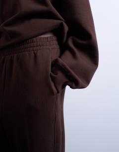 Model wearing Premium heavyweight straight leg jogger in chocolate brown
