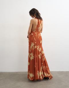 Model wearing Premium high neck open back maxi dress in spaced orange floral