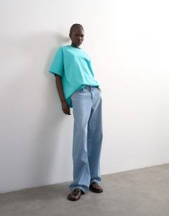Model wearing Premium interlock oversized tee in light blue